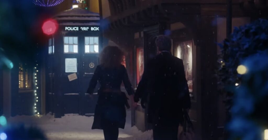The Doctor walks through a Christmas scene