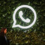 A logo for the chat application WhatsApp depicts a telephone handset inside a chat bubble.