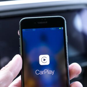 Miskolc, Hungary - May 20, 2018: Apple CarPlay starting up on an iPhone 8 connected to a new Skoda car.