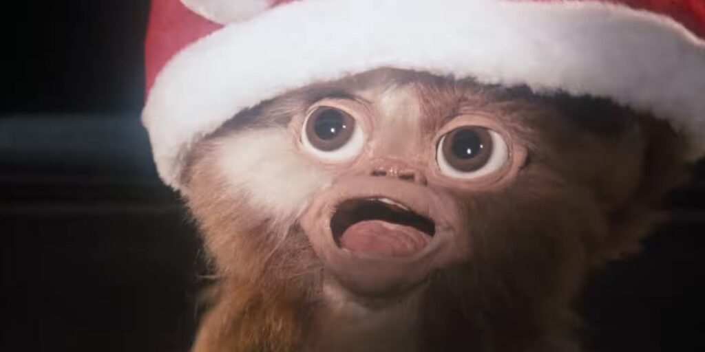 A gremlin with a Christmas hat