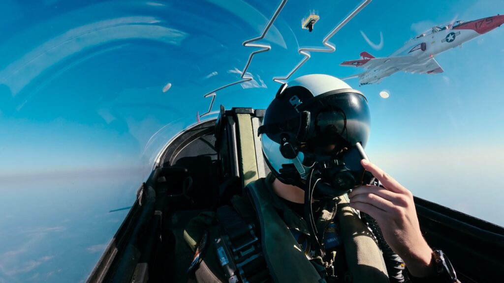 An enemy instructor's jet appears during a dogfighting test.