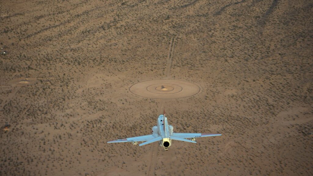 A student makes his first dive at the target