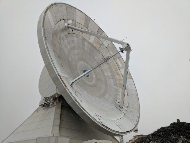Image of a large metal dish.