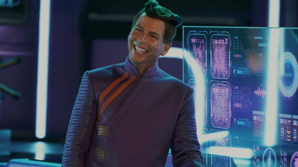 Smiling clean shaven man in a blue uniform