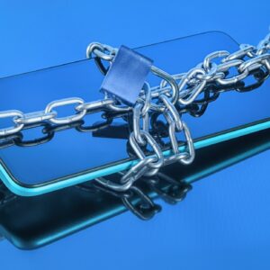 A smartphone wrapped in a metal chain and padlock