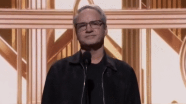 Vince Zampella standing on stage