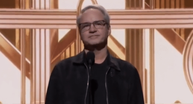 Vince Zampella standing on stage